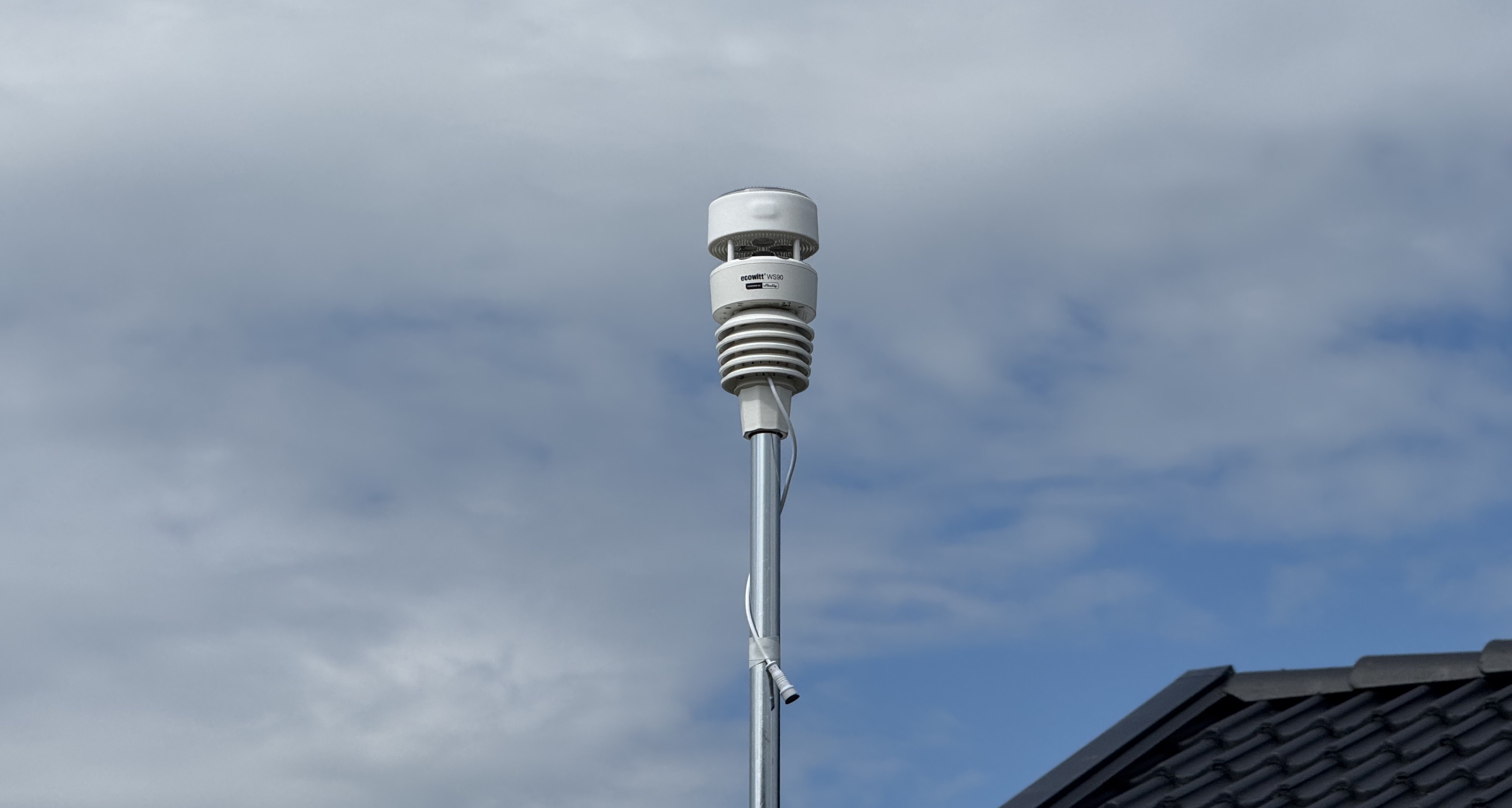 Ecowitt WS90 powered by Shelly, mounted on a pole